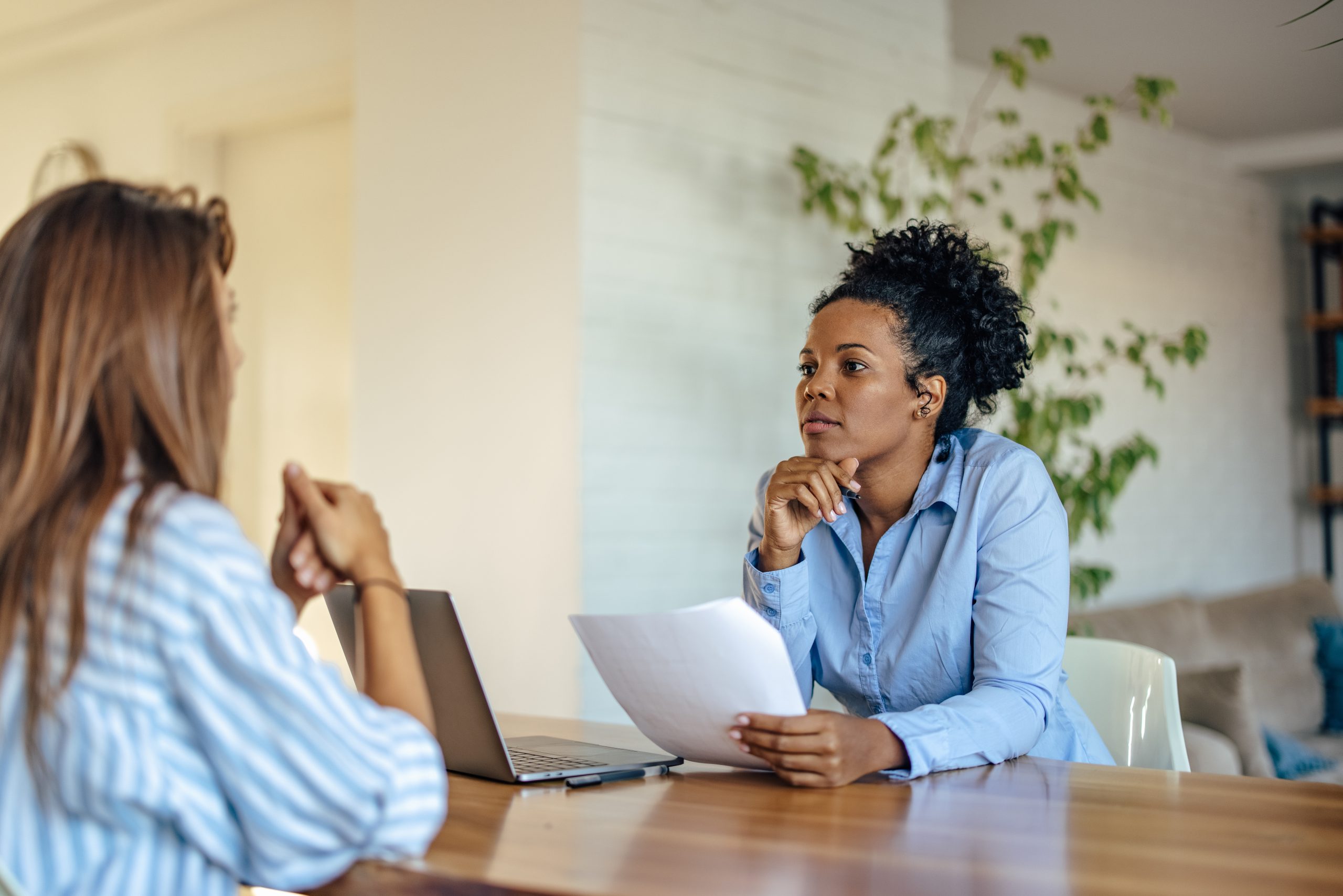 A boss conducting an offboarding interview